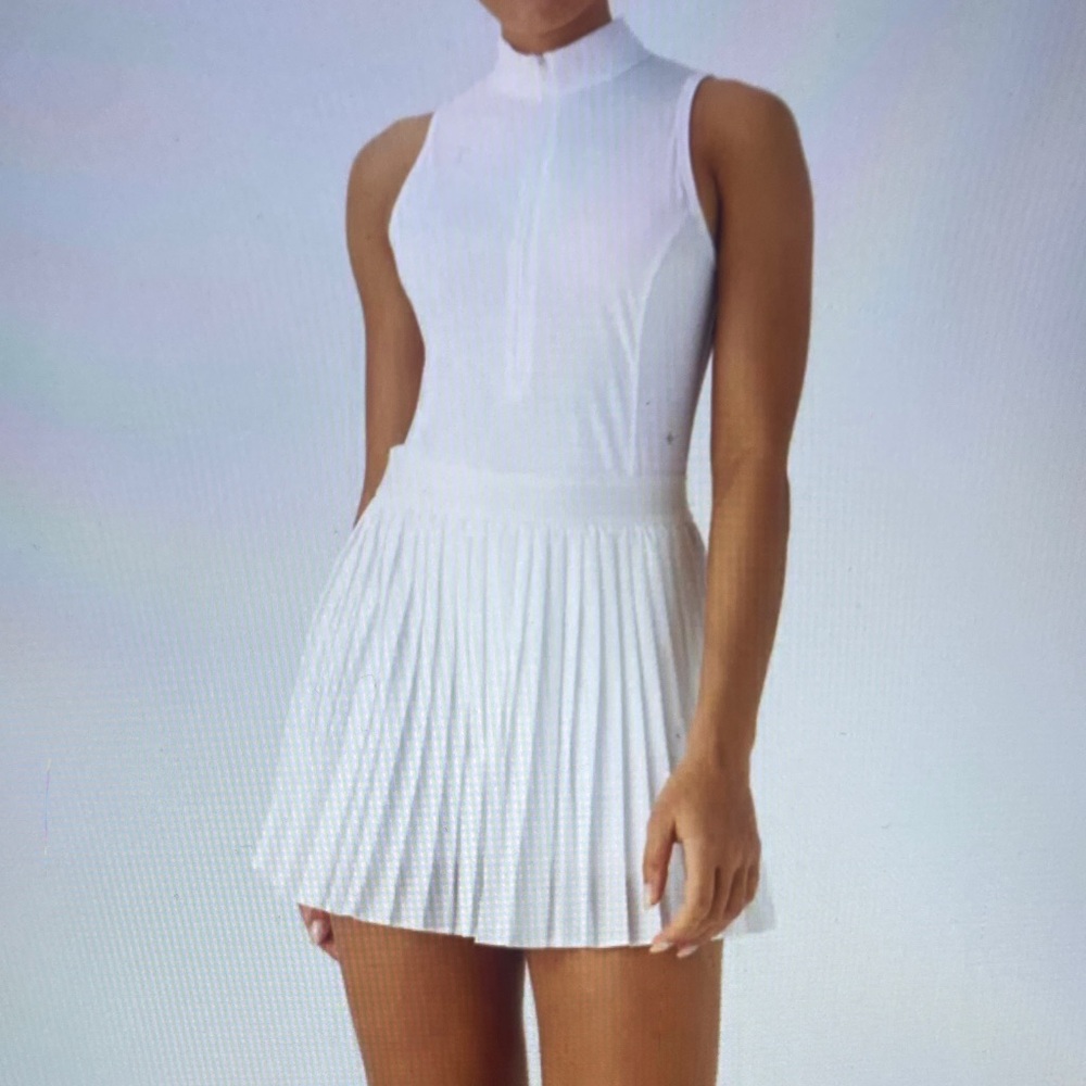 MEDIUM.   HALARA  SLEEVELESS CUT OUT 2 IN 1 PLEATED MINI TENNIS DRESS